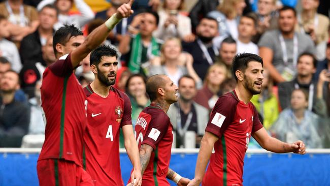 Portugal's defender Pepe (L) celebrates.