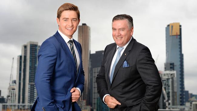 Eddie McGuire (right) shows Seb Costello how to wear a suit properly. Picture: Josie Hayden