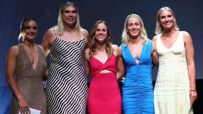 (L-R) Liz Watson, Donnell Wallam, Paige Hadley, Jamie-Lee Price, and Courtney Bruce pose onstage after receiving the SSN Team of the Year award during the 2023 Australian Netball Awards. Picture: Getty Images