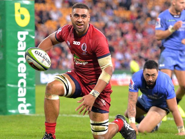 Lukhan Tui celebrates scoring for the Reds against the Force.