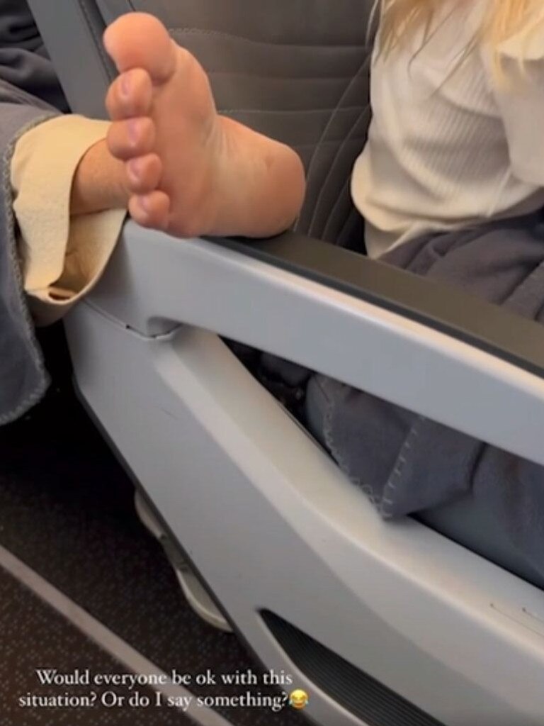 A passenger behind the McCaw’s daughter rested their foot on her armrest. Picture: Instagram (@gemflynn)