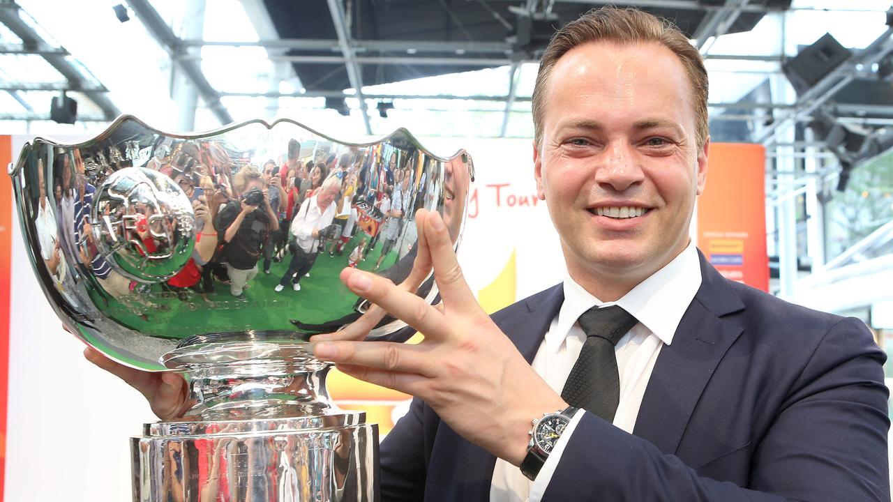 Former Socceroo Mark Bosnich with AFC Champions League trophy in the Queen Street Mall. Pic Jono Searle.