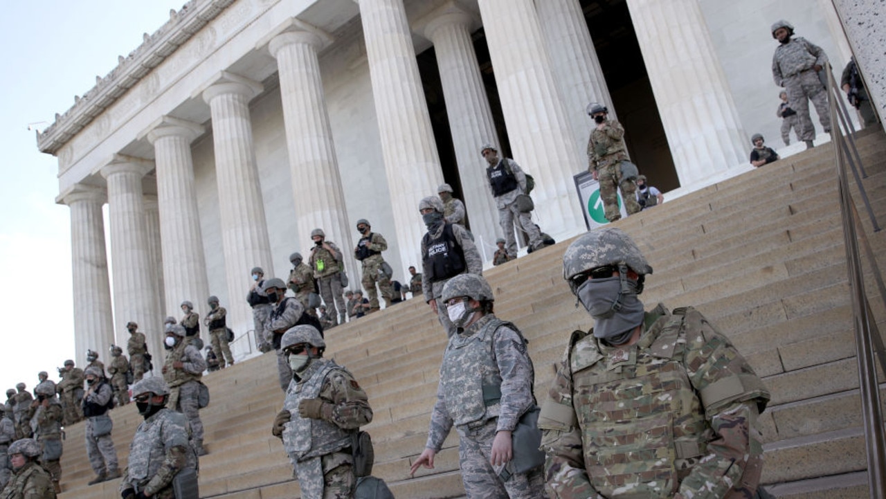 In a stark contrast to images of Trump supporters from January 6, this image shows the National Guard covering the steps of the Capitol building on June 2 last year during the George Floyd Black Lives Matter protests. Picture: Win McNamee/Getty Images