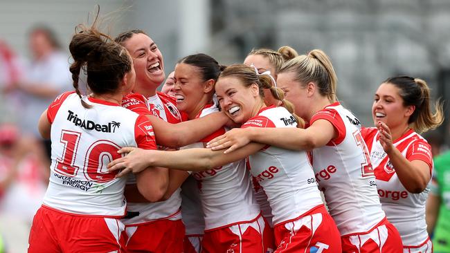 SYDNEY, AUSTRALIA - SEPTEMBER 07: The Dragon celebrate a try to Alexis Tauaneai during the round seven NRLW match between St George Illawarra Dragons and Canberra Raiders at Netstrata Jubilee Stadium on September 07, 2024 in Sydney, Australia. (Photo by Mark Metcalfe/Getty Images)