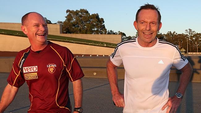  Prime Minister Tony Abbott going for a morning run with QLD Premier Campbell Newman in Canberra . 