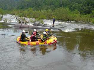 WILD WATER: Volunteer Rescue Association members taking part in swift-water training on the Mann River. Picture: Paul McIntyre