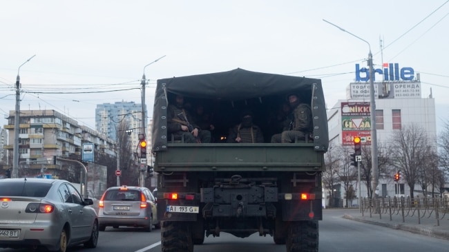 A military vehicle with Ukrainian servicemen is seen on Friday. Picture: Anastasia Vlasova/Getty Images