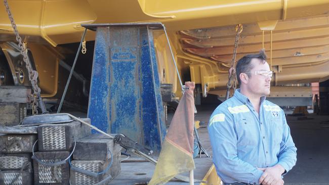 David Komacha, Director DK heavy plant services, Muswellbrook in front of a digger scoop being repaired.