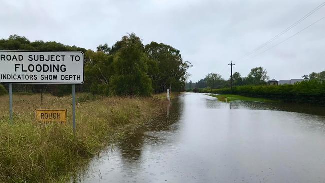 Headlam Road, Moss Vale is flooded with water on March 3. Picture: Phillip Minnis