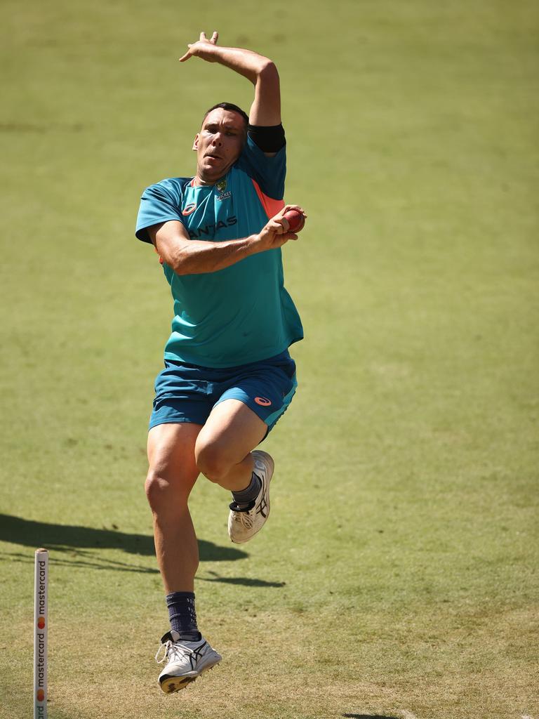 Scott Boland bowls at training. Picture: Robert Cianflone/Getty Images