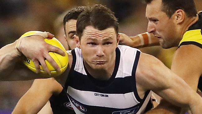 MELBOURNE, AUSTRALIA - SEPTEMBER 20: Patrick Dangerfield of the Cats is tackled by Shane Edwards of the Tigers and Toby Nankervis of the Tigers during the 2019 AFL Second Preliminary Final match between the Richmond Tigers and the Geelong Cats at the Melbourne Cricket Ground on September 20, 2019 in Melbourne, Australia. (Photo by Dylan Burns/AFL Photos)