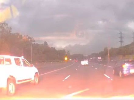 WATCH: Car struck by lightning on Brisbane motorway