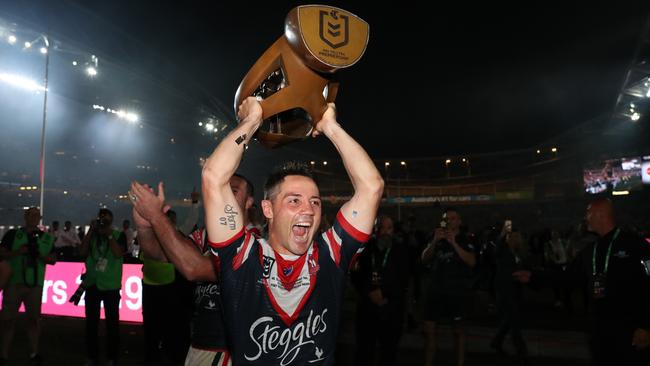 Cooper Cronk celebrates ending his NRL career with a grand final triumph. Picture: Brett Costello.