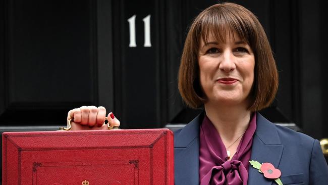 Britain's Chancellor of the Exchequer Rachel Reeves poses with the red Budget Box as she leaves 11 Downing Street. Picture: AFP.