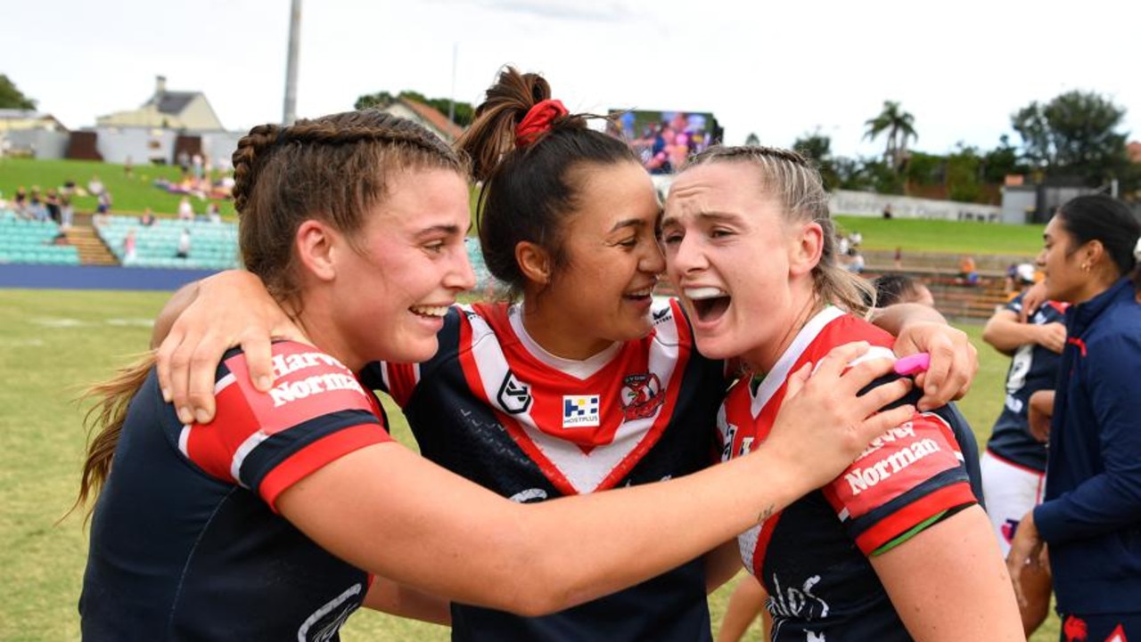 Roosters trio Jessica Sergis Corban Baxter Brydie Parker celebrate their stunning upset.