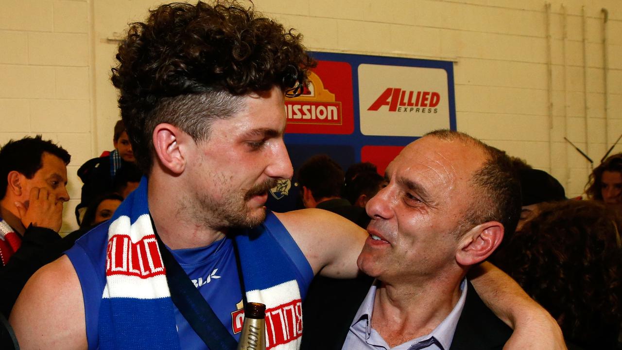 Tom and Tony Liberatore after the Western Bulldogs’ 2016 premiership win (Photo by Adam Trafford/AFL Media/Getty Images).