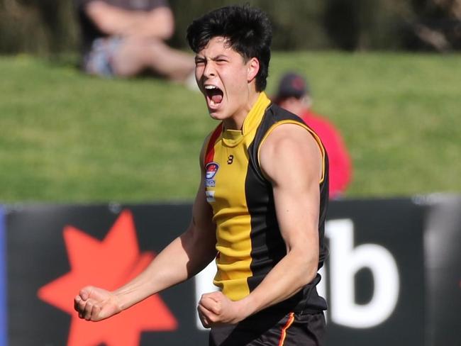 Josh Lai celebrates one of his two semi final goals this September. Picture: Andrew Keech.