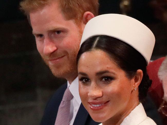 (L-R) Britain's Prince Harry, Duke of Sussex, Britain's Meghan, Duchess of Sussex and Britain's Prince Andrew, Duke of York, are seated as they attend the Commonwealth Day service at Westminster Abbey in London on March 11, 2019. - Britain's Queen Elizabeth II has been the Head of the Commonwealth throughout her reign. Organised by the Royal Commonwealth Society, the Service is the largest annual inter-faith gathering in the United Kingdom. (Photo by Kirsty Wigglesworth / POOL / AFP)