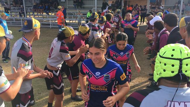 Mabel Park SHS run through a Marsden SHS guard of honour.