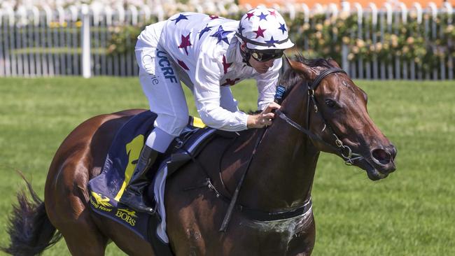 Luke Currie steers Sunlight to victory in the Magic Night Stakes. Picture: AAP