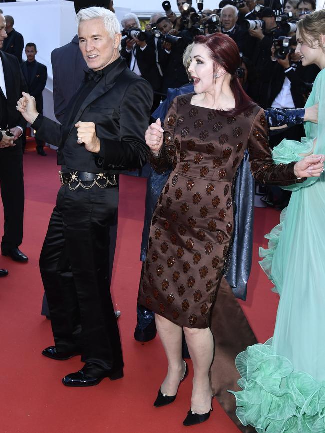 Baz Luhrmann and Priscilla Presley get into the groove.