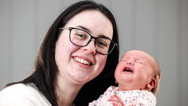 Nurse Hayley Duff with new baby Scarlett, just 16 days old. Image/Russell Millard