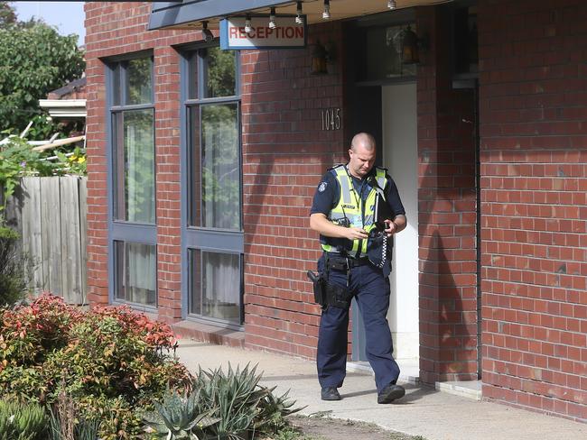 Officers at the scene of the fatal shooting. Picture: Hamish Blair