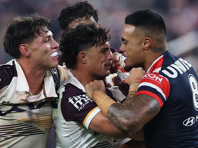 LAS VEGAS, NEVADA - MARCH 02: SpencerÃÂ Leniu (r) of the Roosters exchanges heated words with KotoniÃÂ Staggs of the Broncos during the round one NRL match between Sydney Roosters and Brisbane Broncos at Allegiant Stadium, on March 02, 2024, in Las Vegas, Nevada. (Photo by Ezra Shaw/Getty Images)