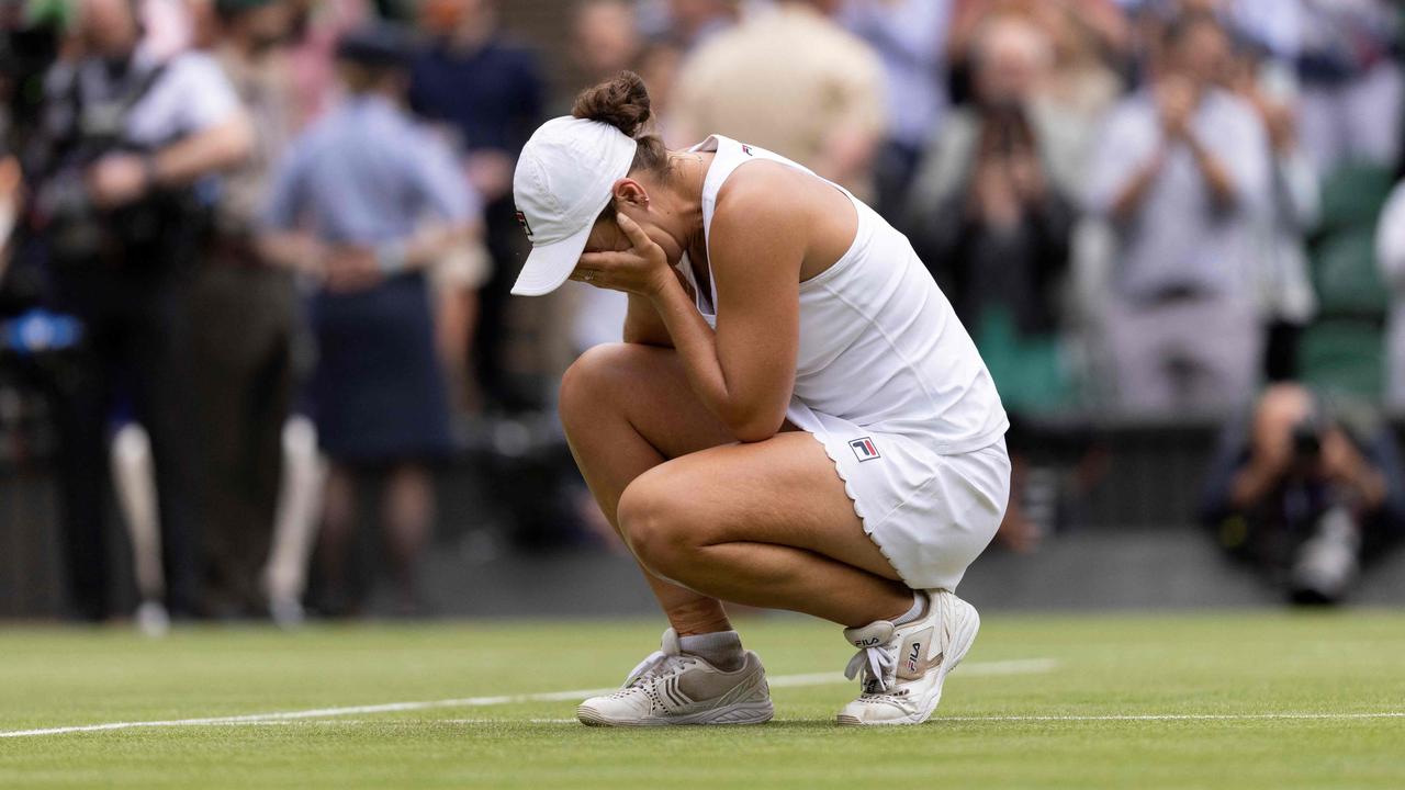 Australia's Ashleigh Barty celebrates winning against Czech Republic's Karolina Pliskova during their women's singles final match on the twelfth day of the 2021 Wimbledon Championships at The All England Tennis Club in Wimbledon, southwest London, on July 10, 2021. (Photo by AELTC/Simon Bruty / POOL / AFP) / RESTRICTED TO EDITORIAL USE
