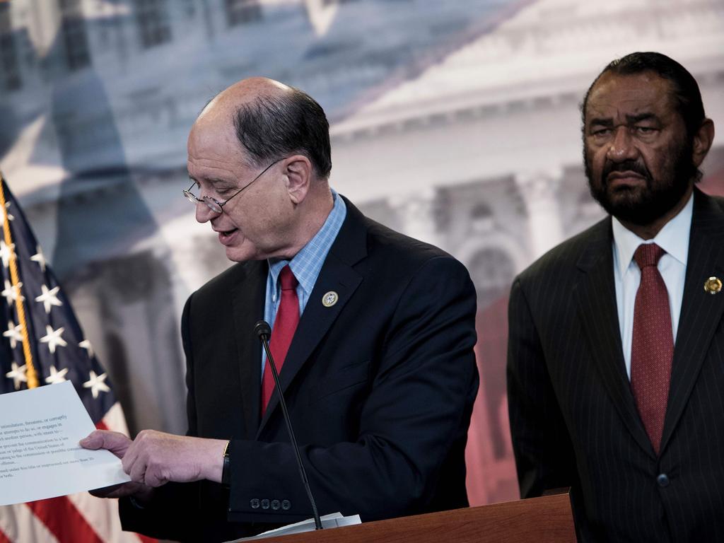 US Representative Brad Sherman (left) Democrat of California, and US Representative Al Green, Democrat of Texas, introduced articles of impeachment against Mr Trump. Pic: AFP