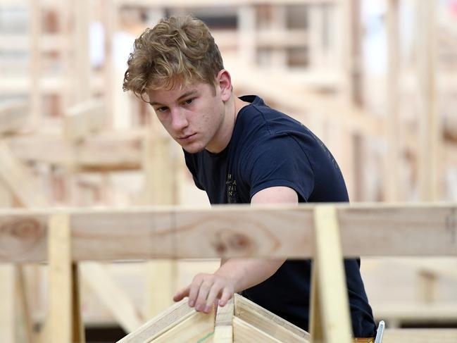 An apprentice carpenter is seen at Holmesglen TAFE Chadstone campus in Melbourne, Monday, May  15, 2017. (AAP Image/Julian Smith) NO ARCHIVING