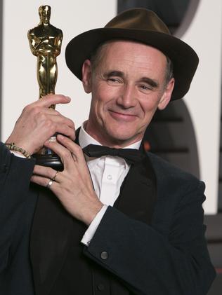 Mark Rylance holds his Oscar.