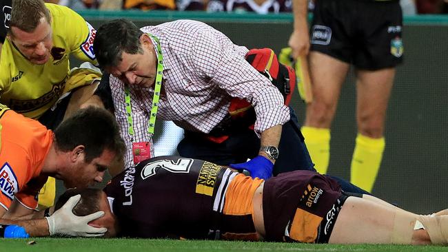 Corey Oates is treated by doctors after a head knock. Picture: Adam Head