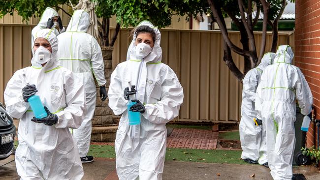 Cleaners get to work to ensure all areas of St Christopher's Catholic Primary School are safe. Picture: Monique Harmer