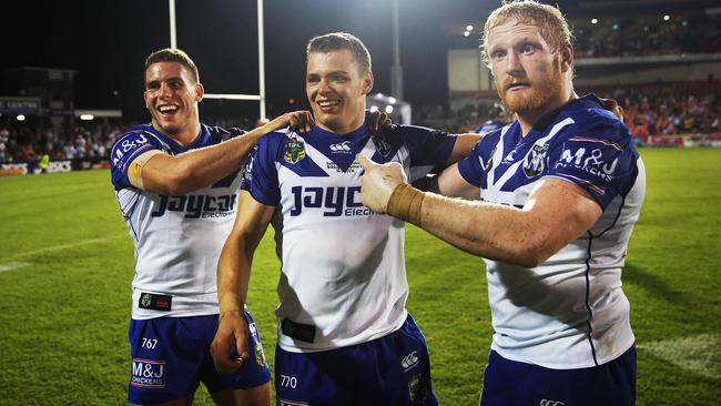 Kerrod Holland after his winning conversion kick with Adam Elliot and captain James Graham. Picture: Phil Hillyard
