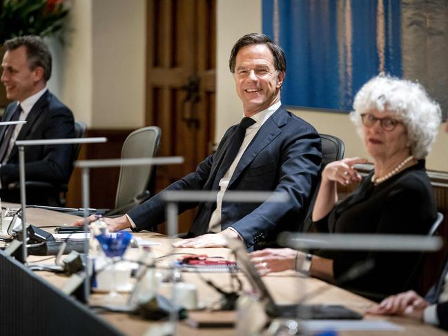 Dutch's Prime Minister Mark Rutte (C) chairs the first council of ministers of the new Rutte-IV cabinet in the Rolzaal of the Binnenhof, in The Hague, on January 10, 2022. (Photo by Bart Maat / ANP / AFP) / Netherlands OUT