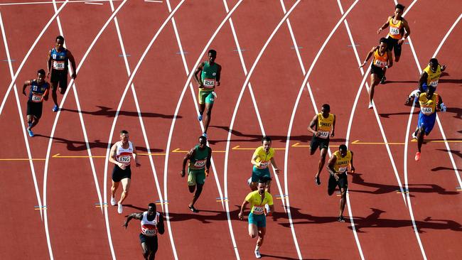 : Harry Aikines-Aryeetey of England leads the race as he takes the baton on the last leg in the Men's 4x100 metres relay final during athletics on day 10 of the Gold Coast 2018 Commonwealth Games. (Photo by Michael Steele/Getty Images)