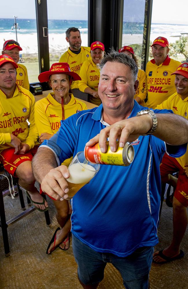 Coolangatta lifesaver Stuart Marshall pouring a frothy one with Patrol Group Seven. Picture: Jerad Williams.