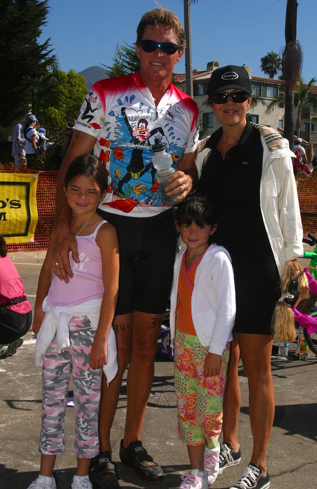 Kendall Jenner, left, with her parents and younger sister, Kylie Jenner, in 2003. Picture: Rod Rolle/Getty Images