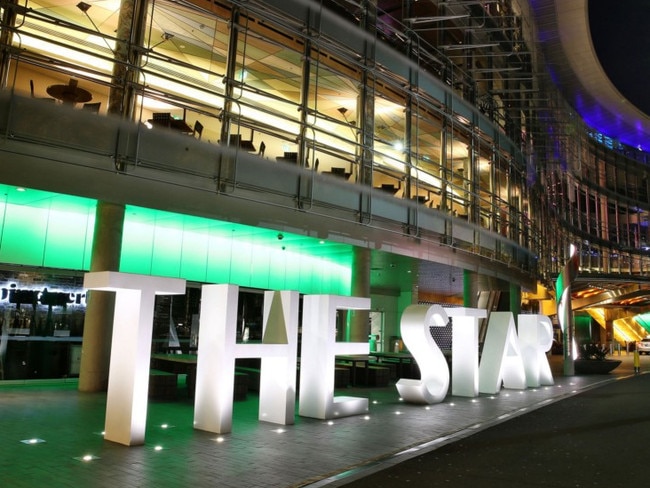 The Star casino, operated by Echo Entertainment Group Ltd., stands illuminated at night in Sydney, Australia, on Monday, Aug. 10, 2015. Echo Entertainment is scheduled to report full-year results on Aug. 12. Photographer: Brendon Thorne/Bloomberg