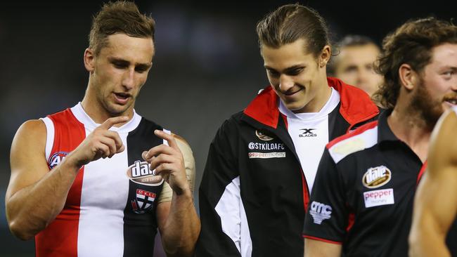 Luke Dunstan chats to new teammate Jack Steele after St Kilda’s win.