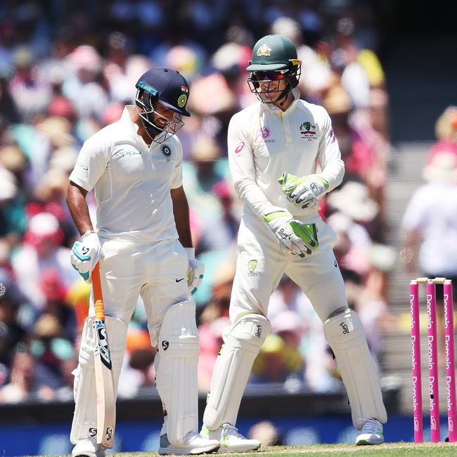 India's Rishabh Pant has a laugh with Tim Paine during Day 2 of 4th Test match between Australia and India at the SCG. Picture: PHIL HILLYARD