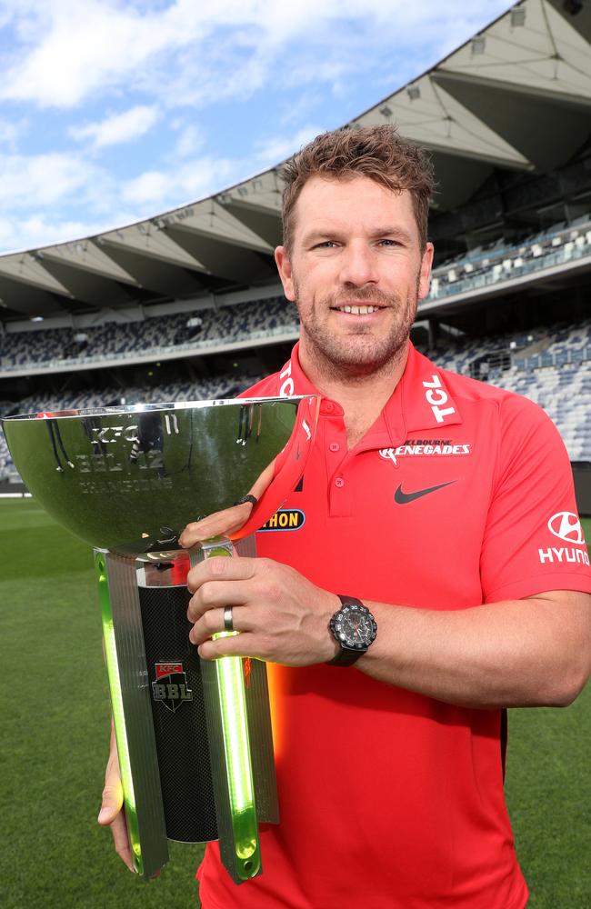 Aaron Finch holds the BBL trophy. Picture: Alan Barber