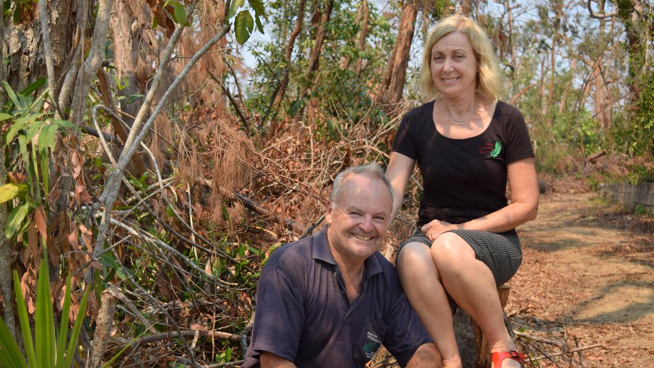 John and Genevieve Martin check out the damage to their property at Ferns Hideaway in Byfield.Photo Austin King / The Morning Bulletin