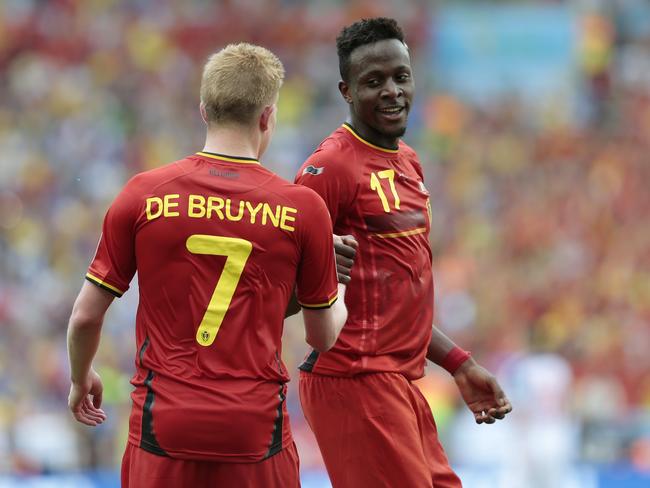 Belgium's Divock Origi, right, celebrates with Kevin De Bruyne after scoring the winner against Russia.