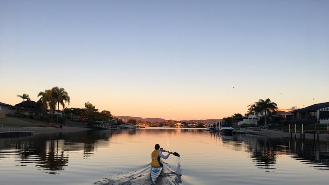 Gold Coast kayaker Cat McArthur paddling early in the morning. Picture: SUPPLIED