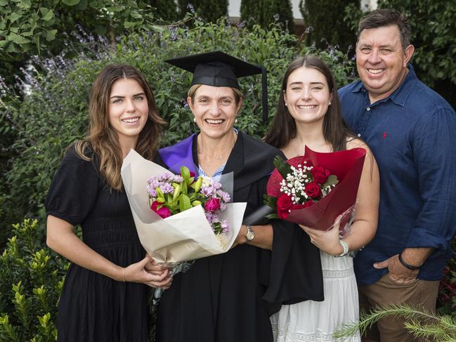 Bachelor of Laws graduate Benita Osborn with daughters Kirra (left) and Teagan and husband Mark Osborn at a UniSQ graduation ceremony at Empire Theatres, Tuesday, February 13, 2024. Picture: Kevin Farmer