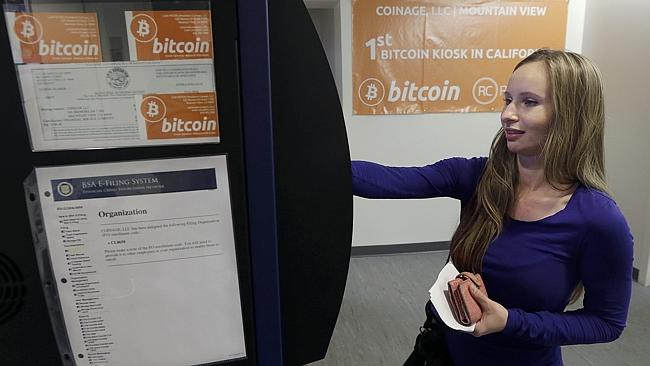 Anastasia Navarova sets up an account to use a Robocoin kiosk at a Bitcoinferance in Cali