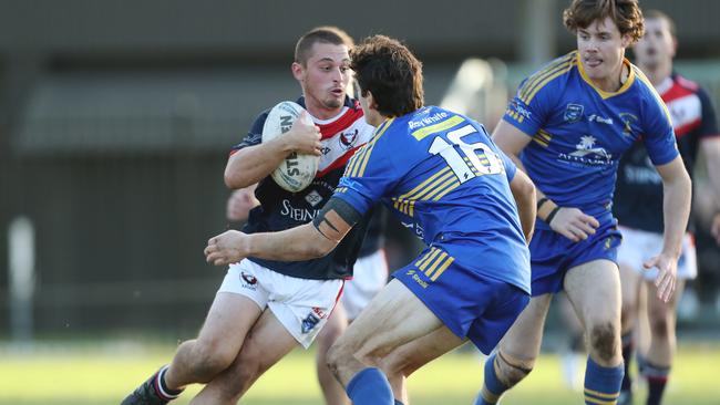 Erina snapped a three-game losing streak against the Hawks to qualify for the grand final. Picture: Sue Graham