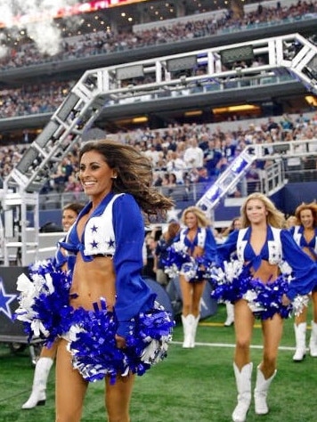 Jinelle Davidson performing with Dallas Cowboys cheerleaders.